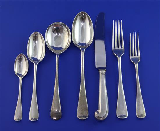 A part canteen of early 20th century silver Hanovarian pattern flatware, weighable silver 64.5 oz.